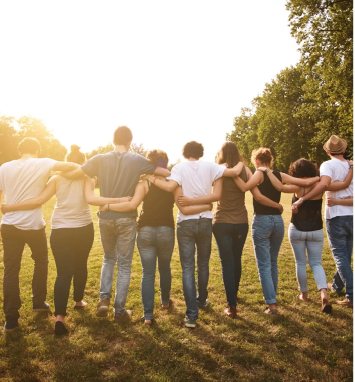 group of young men and women embracing one another