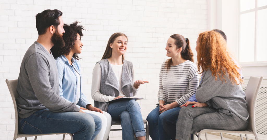 people sitting in a group at therapy