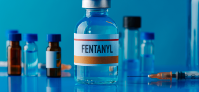 a bottle of fentanyl with other vials of it next to the bottle